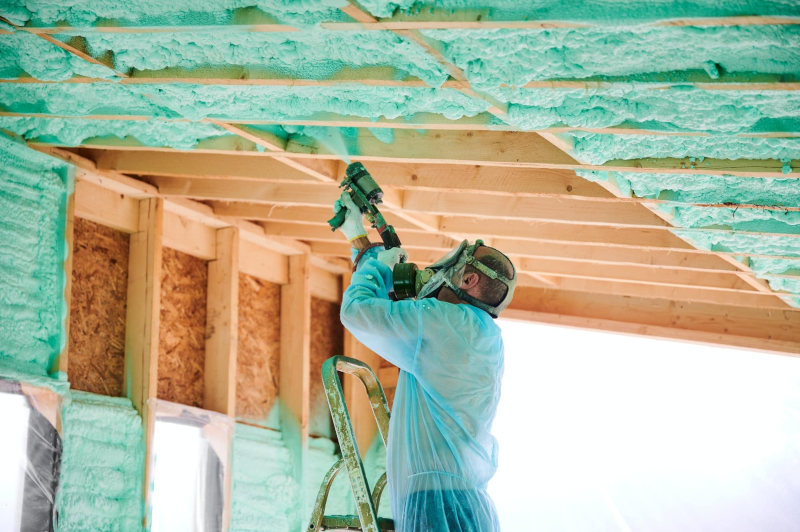 Spray foam insulation installed on a new home construction New home construction spray foam insulation services Detroit